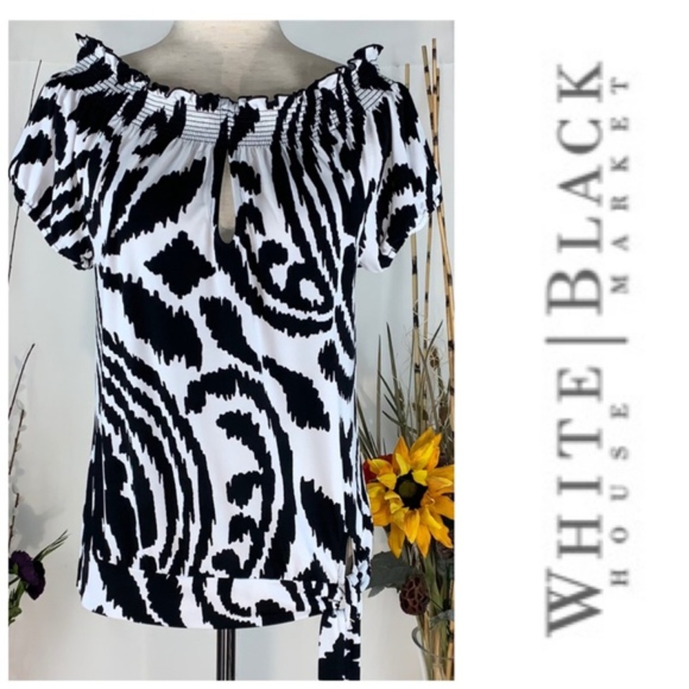 White House Black Market black & white Zebra striped off-the-shoulder top.